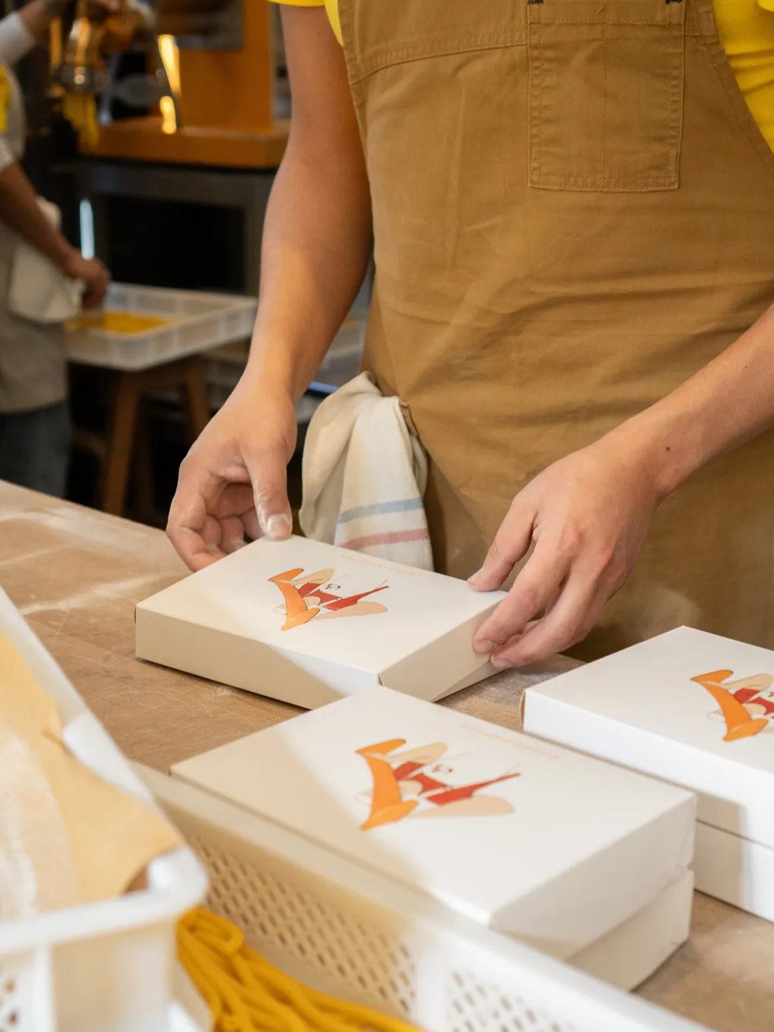 Cajas blancas de La Alacena listas para llevar